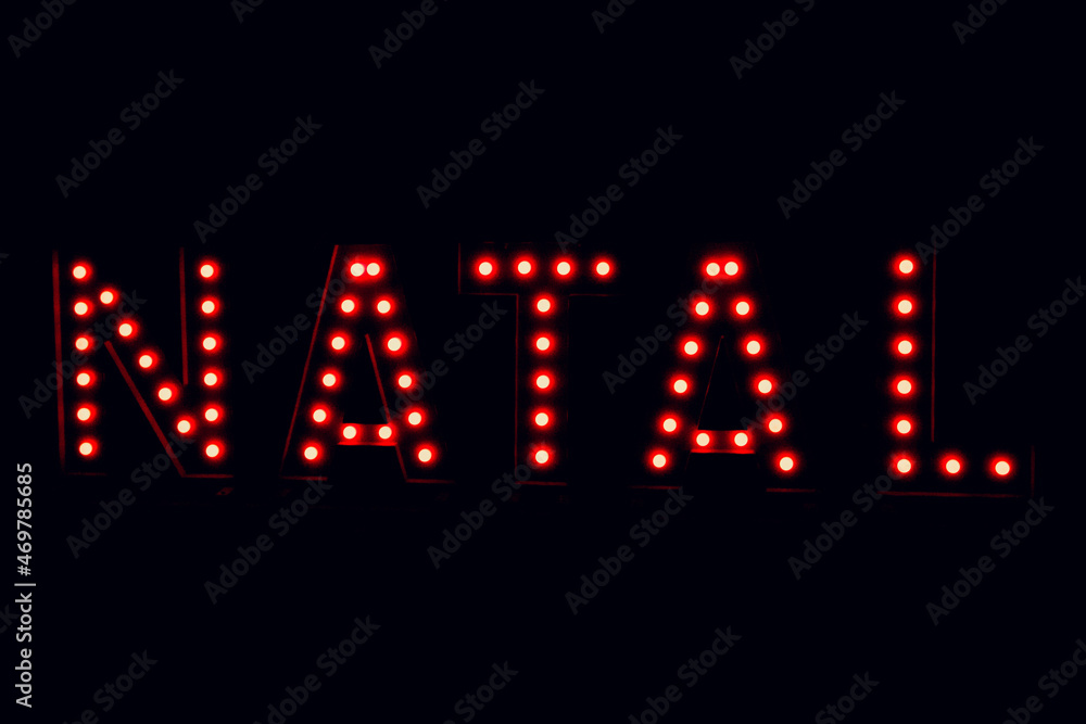 Christmas written in portuguese in 3D red lights. Christmas 3D background, space for text.. Christmas written in portuguese in 3D red lights. Christmas 3D background, space for text..