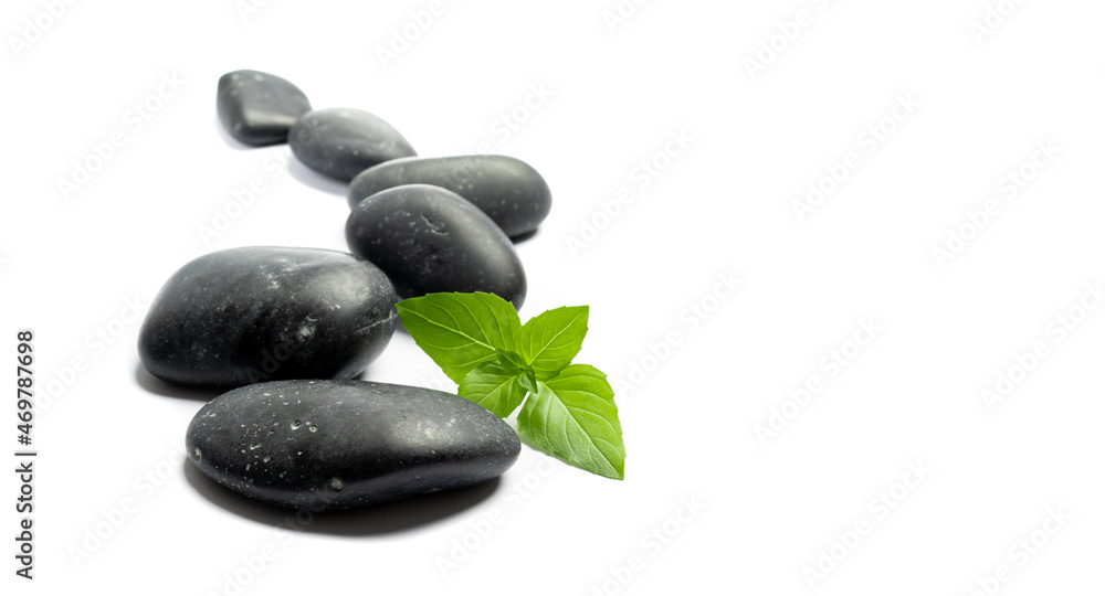 Fototapeta premium Severeal spa stones on white background