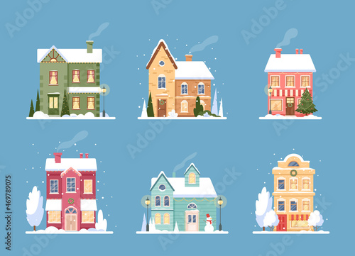 Christmas house. Vector set of winter xmas village with house in snowfall, rural cottages with smoking chimney, lanterns, trees and festive garlands in flat design. Merry Christmas. Winter landscape