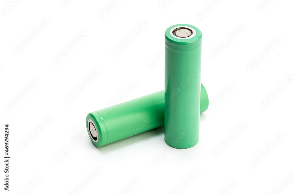 Pair of Green batteries isolated on white background. Blank 18650 Li-ion battery. Copy space Pair of Green batteries isolated on white background. Blank 18650 Li-ion battery. Copy space