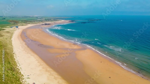 Wallpaper Mural Embleton Bay and Burn beach with the ruins of Dunstanburgh Castle Torontodigital.ca