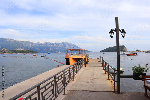 View of St. Nicholas Island and pier in Budva, Montenegro © Lindasky76