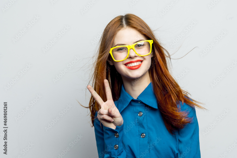 woman in blue shirt yellow glasses charm glamor woman in blue shirt yellow glasses charm glamor