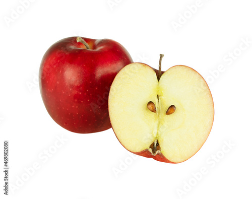 Red apple whole and half isolated on white background.