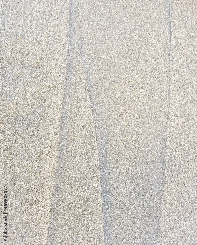 Obraz premium White sand texture with lines and grain