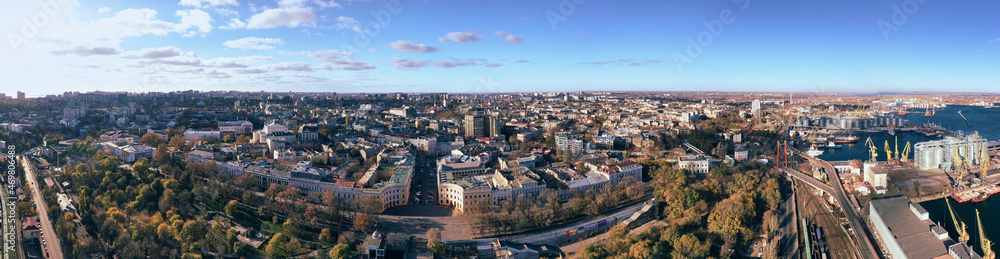 Autumn panorana the city landscape with Potemkin Stairs, sea port and Primorsky Boulevard  in Odessa Ukraine. Drone footage, golden hours.