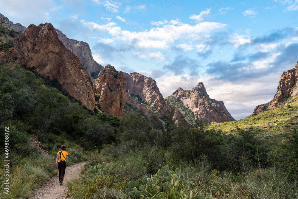 A hiker walking thtough the mountains of Big Bend National Park