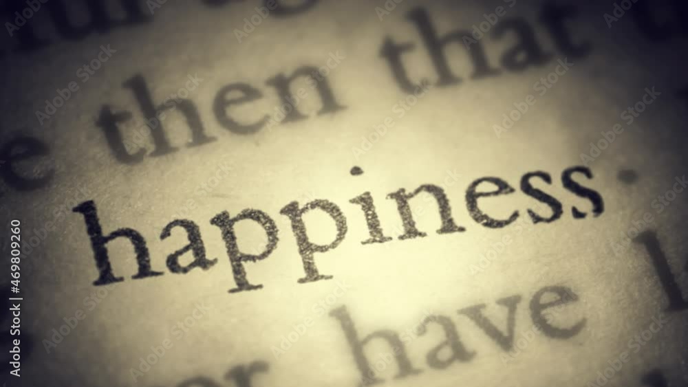 The word Happiness on the old page in the book is separated from the general text and zooms into the camera. Creative 3D 4k slow motion video animation.