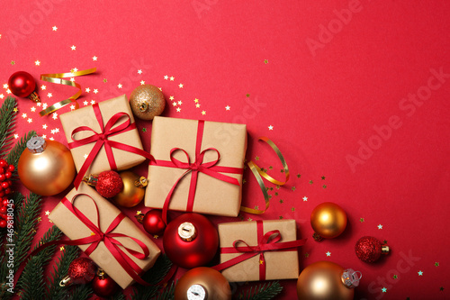 Christmas decorations and gifts on a colored background top view
