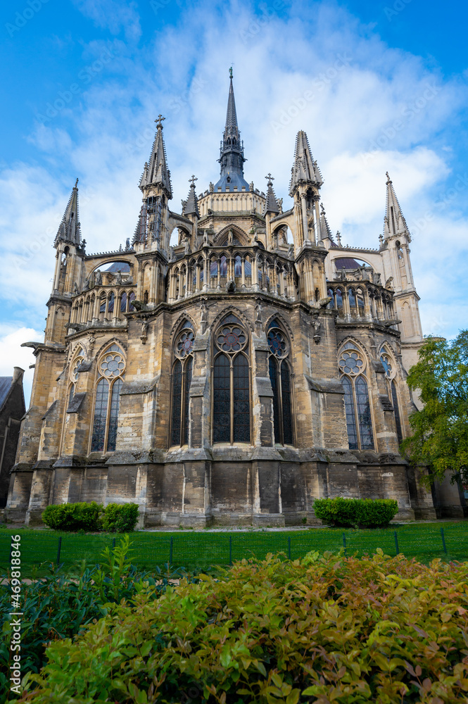 View from back side on gothic Roman Catholic cathedral church Notre-Dame in central part of old French city Reims, France View from back side on gothic Roman Catholic cathedral church Notre-Dame in central part of old French city Reims, France