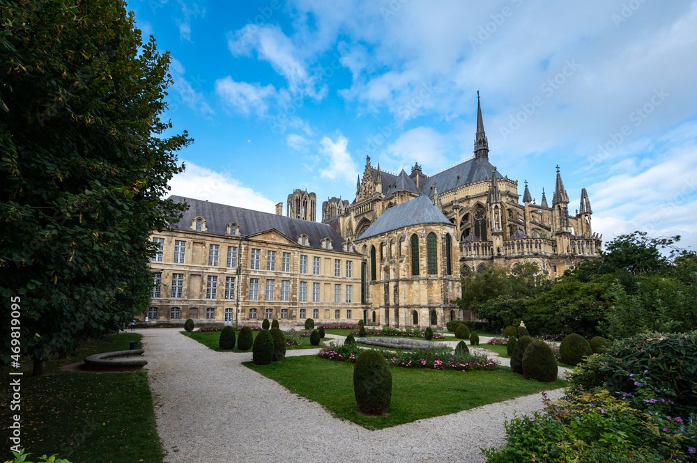 View from back side on gothic Roman Catholic cathedral church Notre-Dame in central part of old French city Reims, France