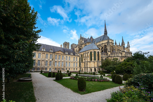 View from back side on gothic Roman Catholic cathedral church Notre-Dame in central part of old French city Reims, France