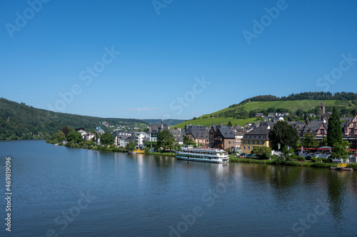 View on Mosel river, hills with vineyards and old town Traben-Trarbach, Germany © barmalini