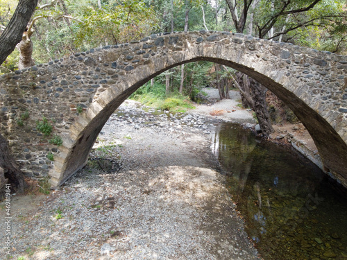 Medieval venetian stone arch bridge located in Troodos mountains, Cyprus © barmalini