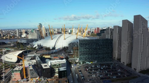 Aerial bird's eye view of the iconic O2 Arena near isle of Dogs and Emirates Air Line cable car in London, United Kingdom photo