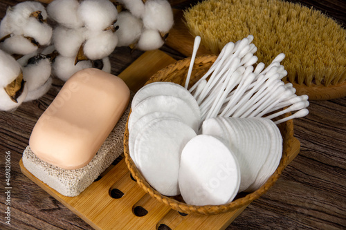 Hygienic accessories for spa treatments. Cotton swabs, natural cotton discs, pumice and soap.