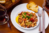 Turkish seafood octopus salad Ahtapot salatasi in a white ceramic plate