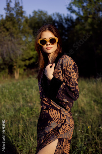 fashionable woman in sunglasses outdoors summer glamor