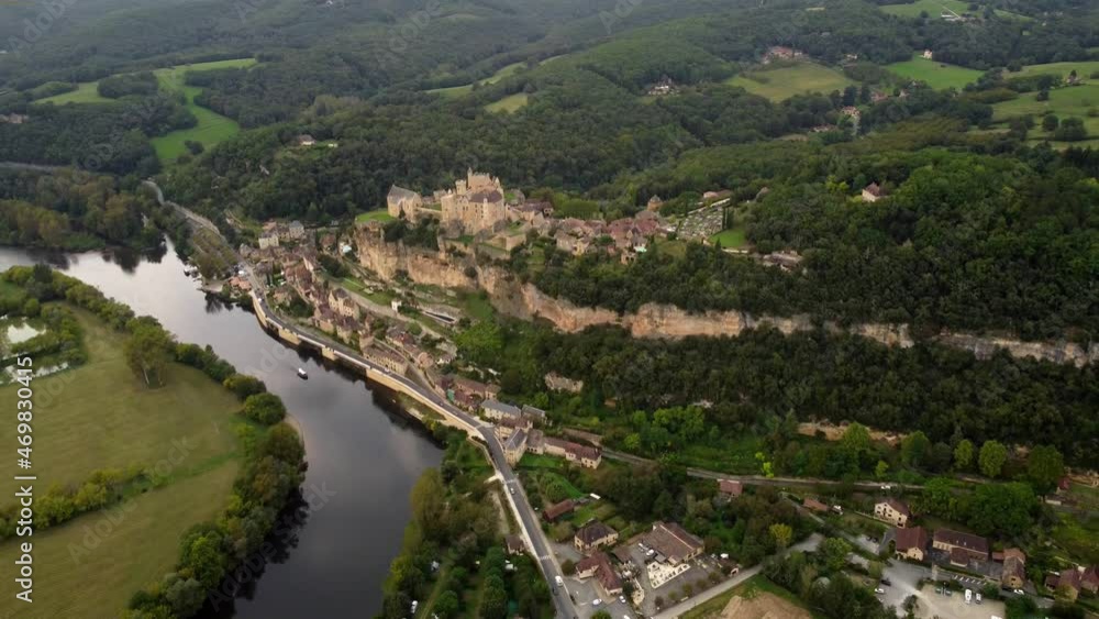 Aerial view of Beynac et cazenac france medieval small stone village in the dordogne forest wood land travel holiday famous destination Aerial view of Beynac et cazenac france medieval small stone village in the dordogne forest wood land travel holiday famous destination