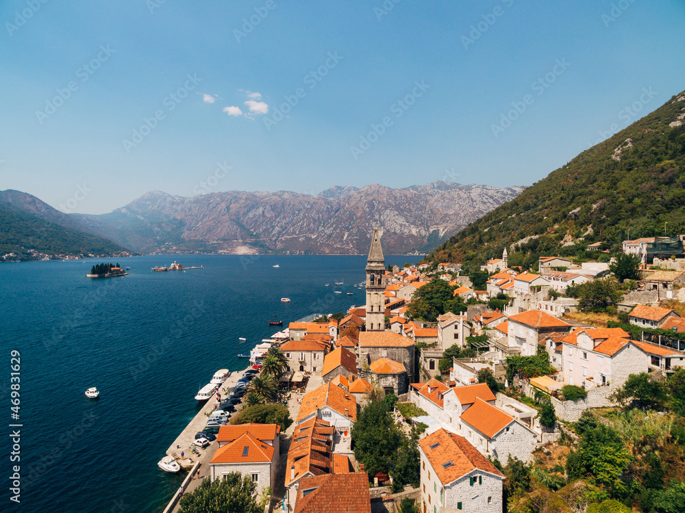Drone view of the red roofs of ancient Perast houses. Montenegro