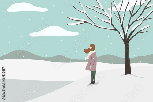 woman in winter park. standing woman in land scape.