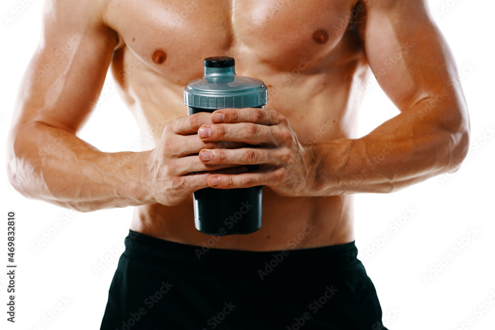 Naklejka premium athletic man with a pumped-up torso drink bottle sportspit