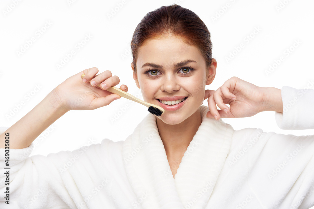 Woman in white coat toothbrush oral hygiene Woman in white coat toothbrush oral hygiene