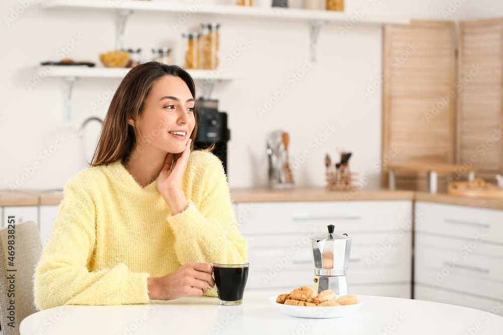 Morning of beautiful woman drinking coffee at home Morning of beautiful woman drinking coffee at home