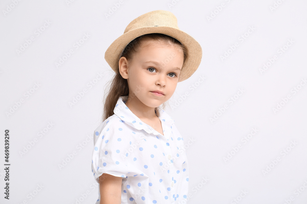 Portrait of pretty little girl on light background Portrait of pretty little girl on light background
