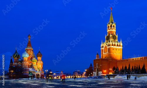 Evening St. Basil's Cathedral and the Spasskaya Tower of the Moscow Kremlin on Red Square in winter, Russia..