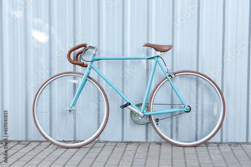 Stylish bicycle near light ...