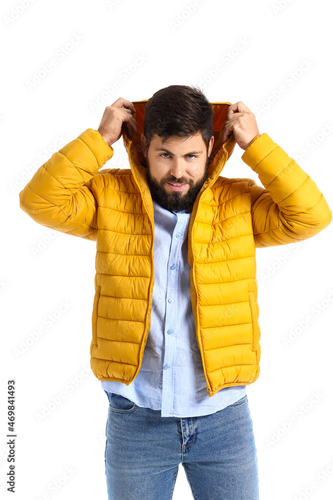 Handsome man in bright yellow jacket on white background Handsome man in bright yellow jacket on white background