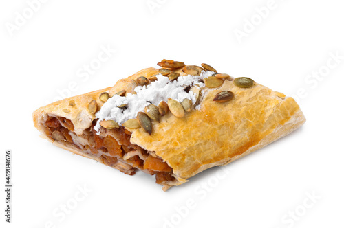 Piece of delicious pumpkin strudel on white background