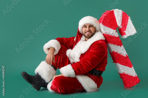 Santa Claus with candy cane...