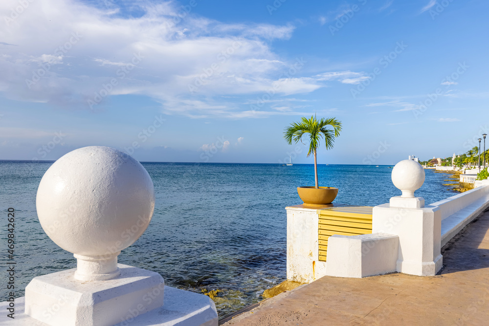 Naklejka premium San Miguel de Cozumel, Mexico, sea Malecon route with sculptures and scenic ocean views going along the ocean shore.