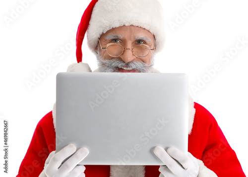 Santa Claus with modern lap...