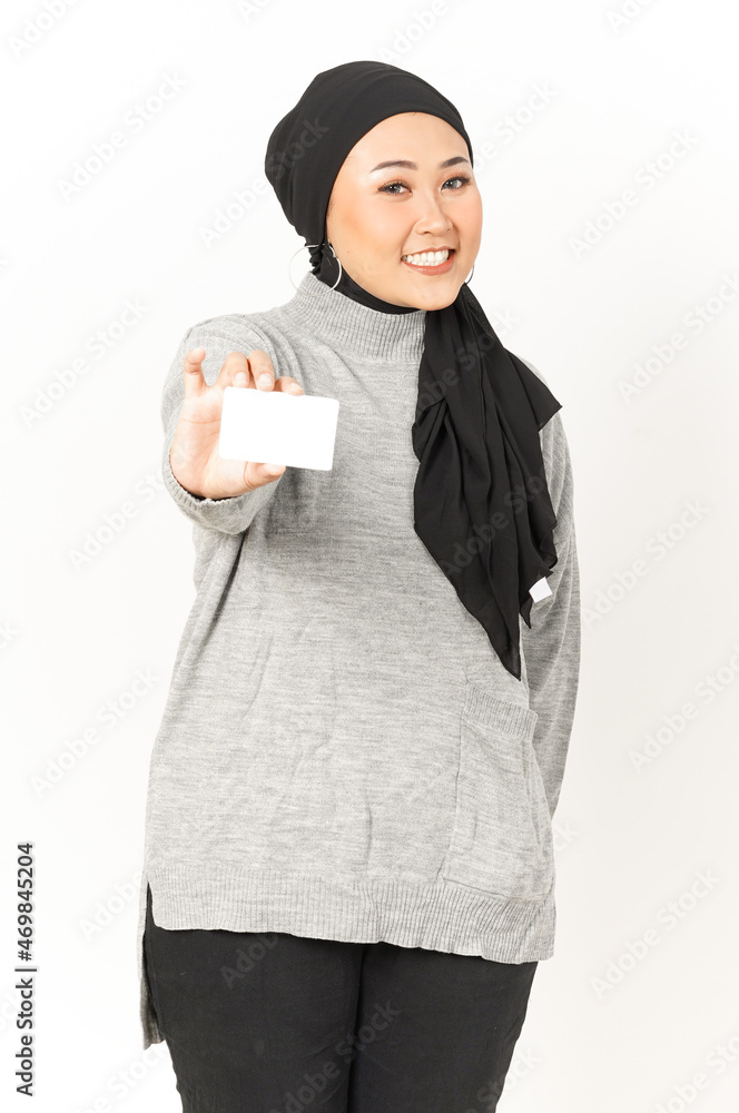 Holding and Showing Blank Credit Card of Beautiful Asian Woman Wearing Hijab Isolated On White Holding and Showing Blank Credit Card of Beautiful Asian Woman Wearing Hijab Isolated On White