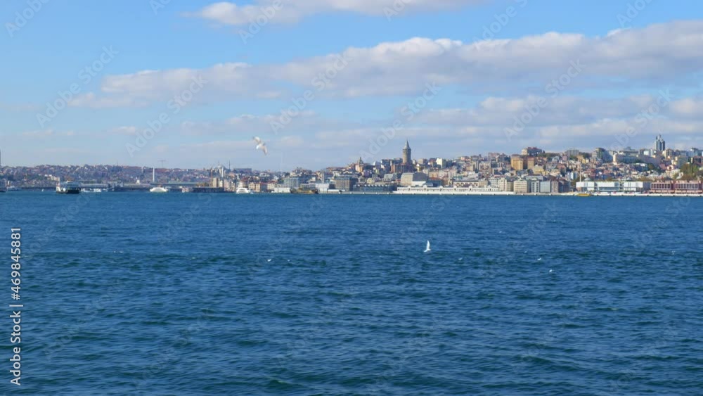 Istanbul cityscape with Galata tower in the background. Bosphorus ferry and cruise view in in the strait of Istanbul. Istanbul cityscape with Galata tower in the background. Bosphorus ferry and cruise view in in the strait of Istanbul.