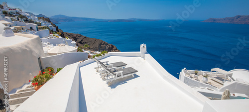 Amazing terrace landscape, caldera view Santorini, Greece with chairs loungers. Romantic couple destination with idyllic blue sky, clouds wonderful summer scenery, travel vacation, holiday. Inspire
