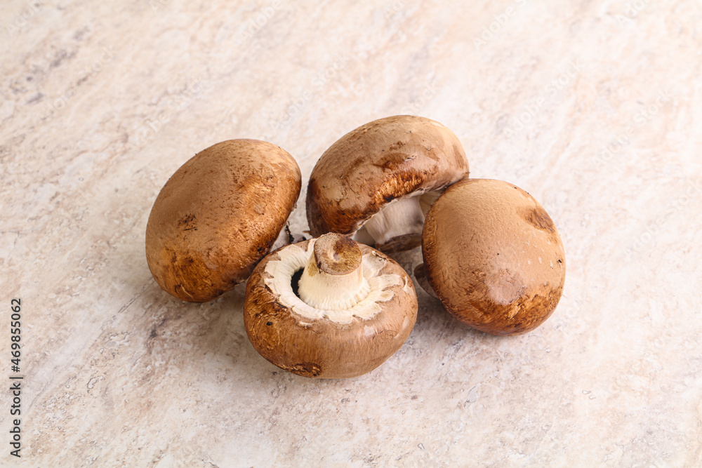 Raw brown champignons mushroom heap Raw brown champignons mushroom heap
