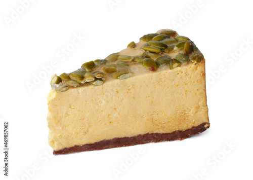 Piece of cheesecake with nuts isolated on white background