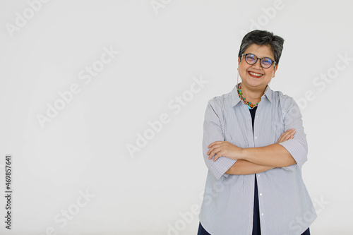 Cheerful Asian woman with crossed arms