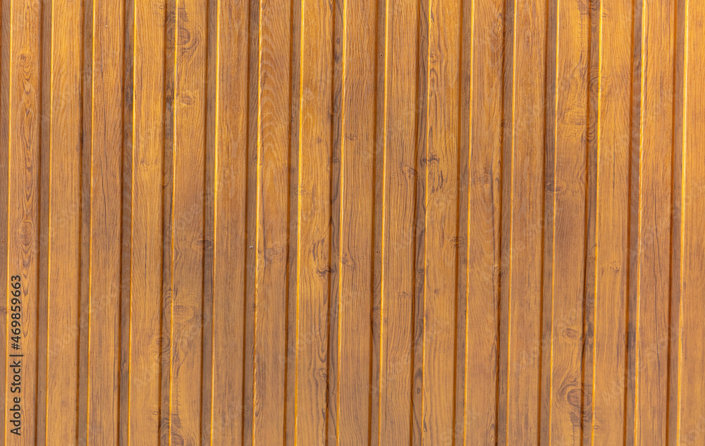 Fototapeta premium Wooden boards in the wall as a background.