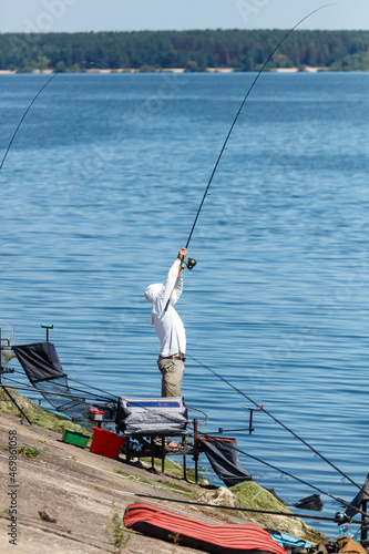 A man fishing with a rod