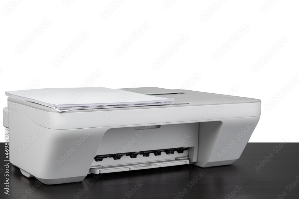 Laser home printer on table against white backgorund Laser home printer on table against white backgorund