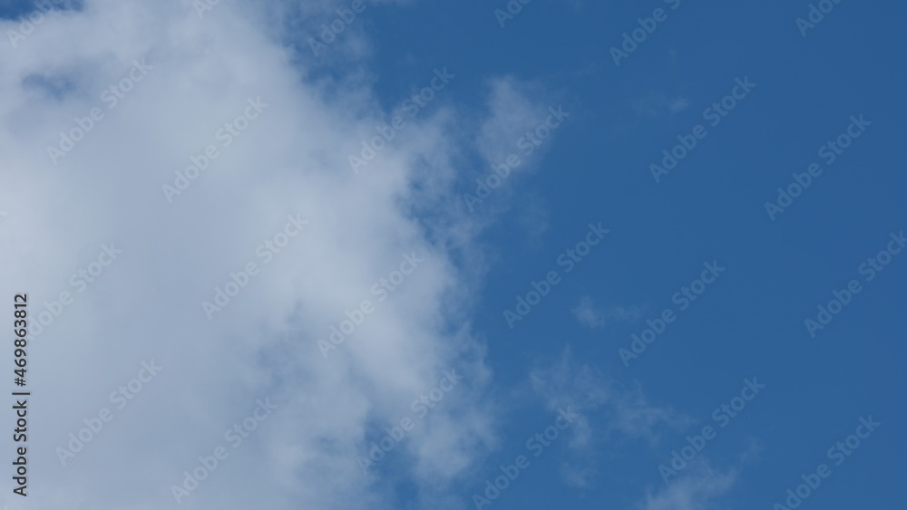 View of beautiful blue sky background with white clouds at the noon, Bangkok, Thailand. View of beautiful blue sky background with white clouds at the noon, Bangkok, Thailand.