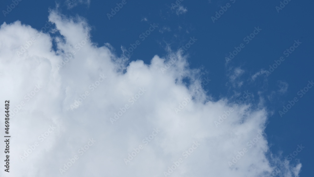 View of beautiful blue sky background with white clouds at the noon, Bangkok, Thailand. View of beautiful blue sky background with white clouds at the noon, Bangkok, Thailand.