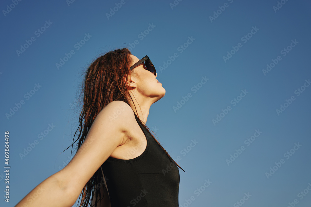 woman in black swimsuit sunglasses sun nature woman in black swimsuit sunglasses sun nature