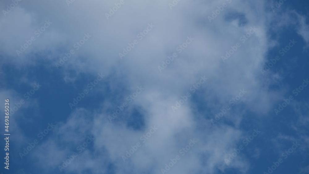 View of beautiful blue sky background with white clouds at the noon, Bangkok, Thailand. View of beautiful blue sky background with white clouds at the noon, Bangkok, Thailand.