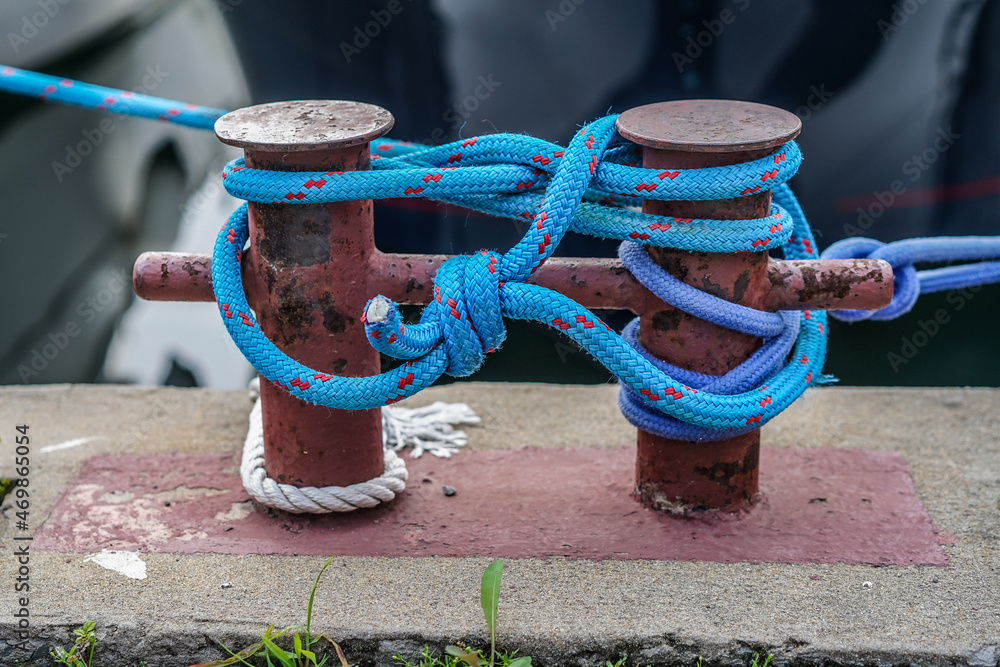 Blue ship's mooring rope on a blurry background Stock Photo | Adobe Stock